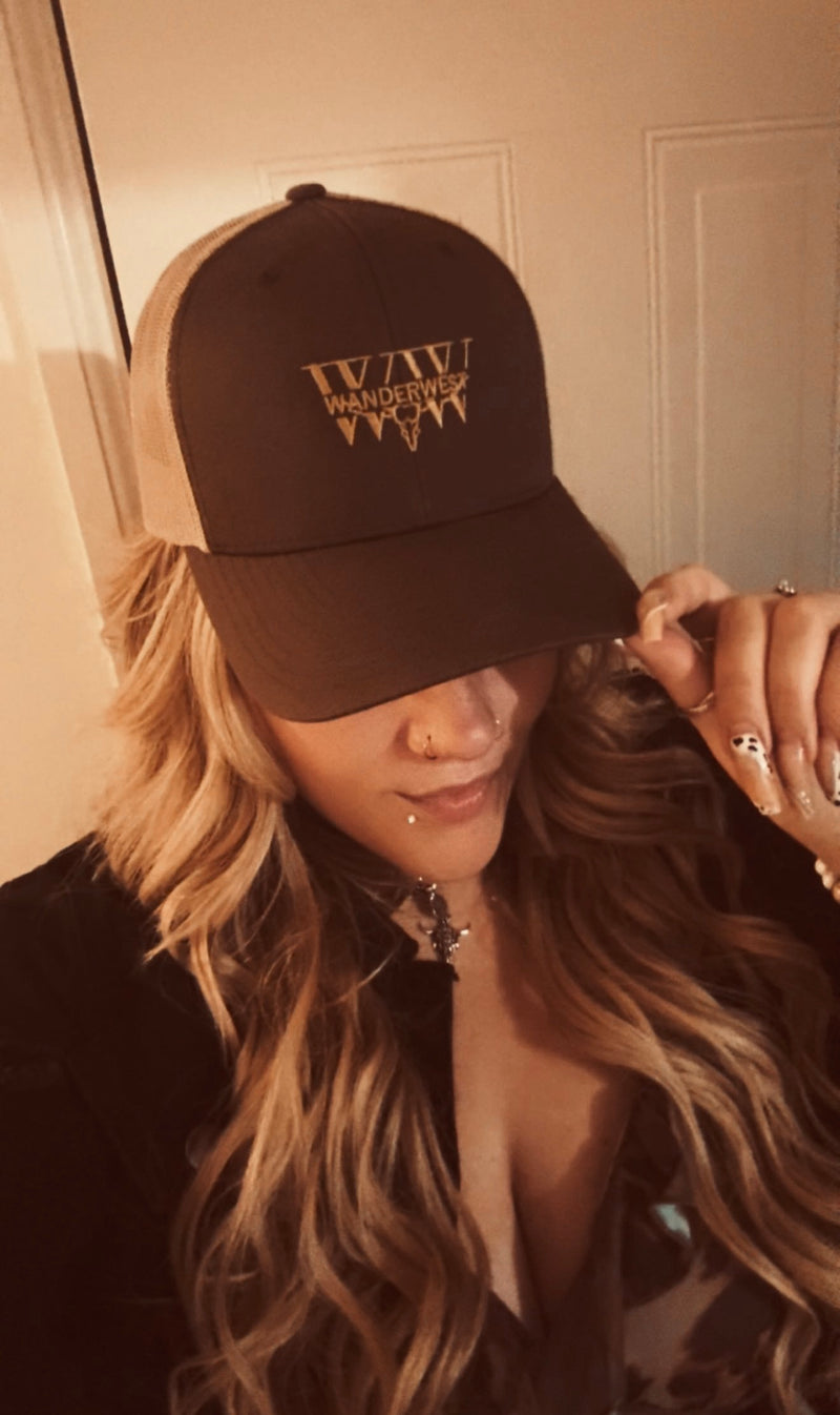 WanderWest UK customer photos — hats, hoodies, tees